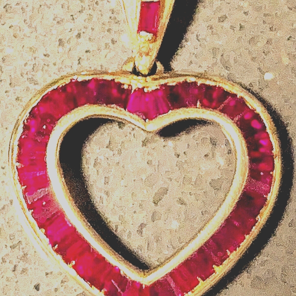 Vintage Gold Heart-Shaped Pendant with Baguette-cut Rubies